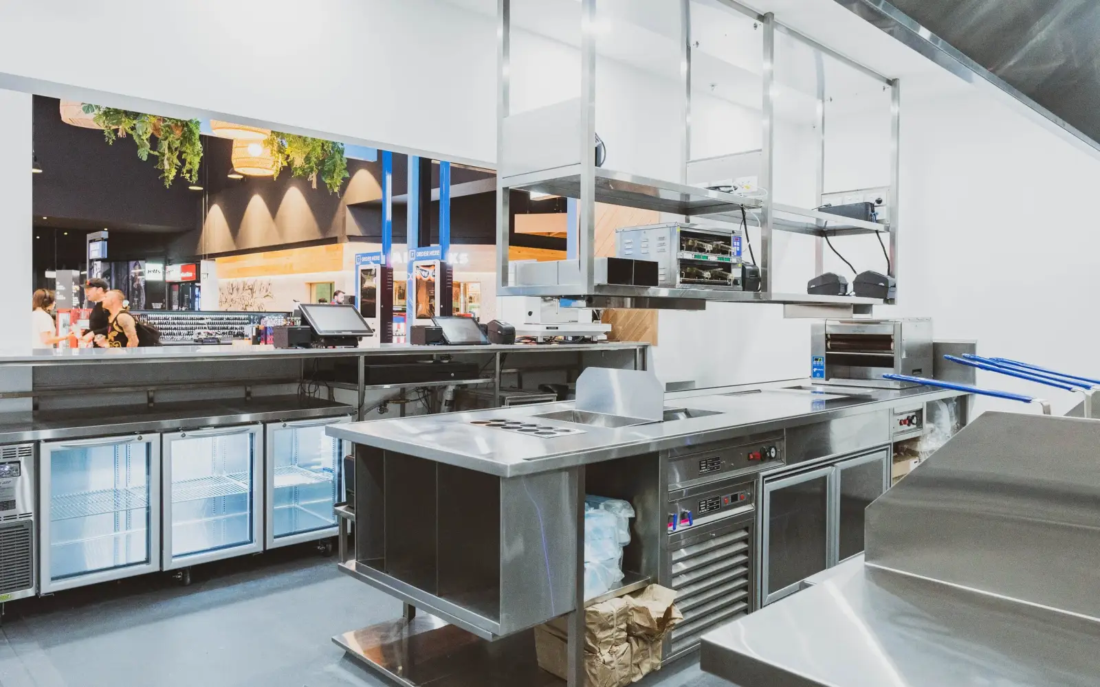 Stainless steel commercial kitchen with service counter